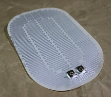 Poliestrowy element grzewczy do lusterek wstecznych samochodu