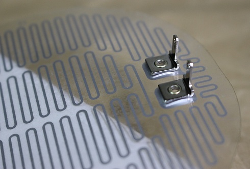 Poliestrowy element grzewczy do lusterek wstecznych samochodu