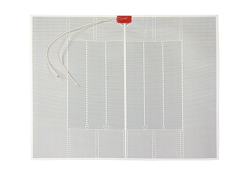 Poliestrowy element grzejny